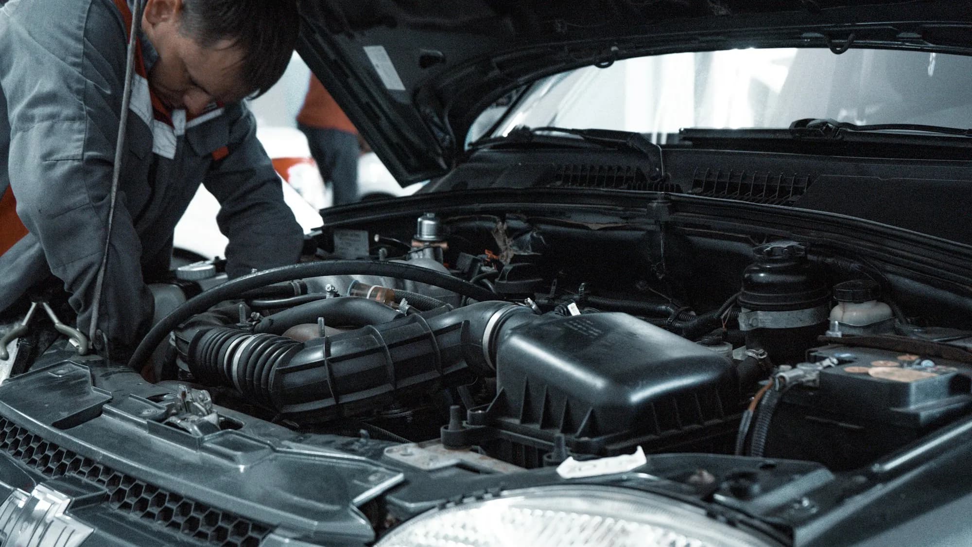 Close-up of a modern automotive engine bay during maintenance
